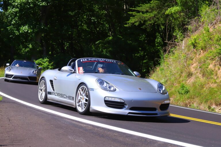 Porsche driving on a road during the Fikse and Smoky Mountain rally